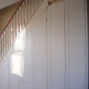 Barnes - Under stairs shaker style storage 