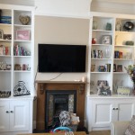 Pair of alcove shelves and cabinets £2400