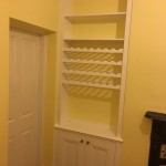 Alcove cabinets with wine rack shelves